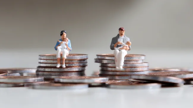 people sitting on coins